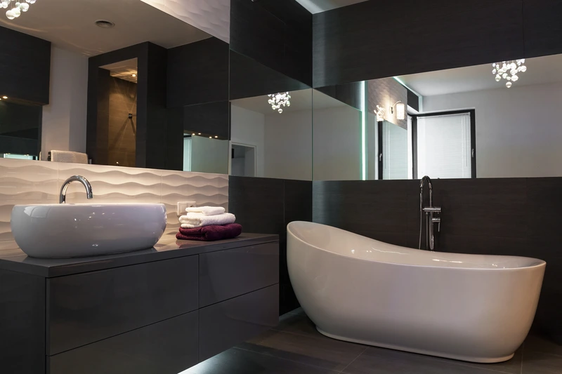 Dark spa-style bathroom construction in San Jose with modern finishes and clean design