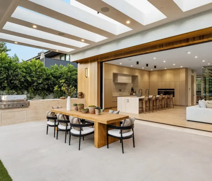 San Jose home addition with indoor-outdoor living space, covered patio, and expanded kitchen opening to backyard